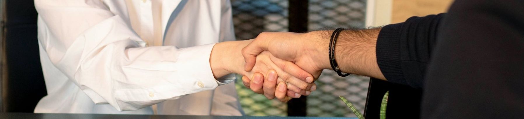 Handshake symbolizing a successful pre-approved loans with AAA Finance.