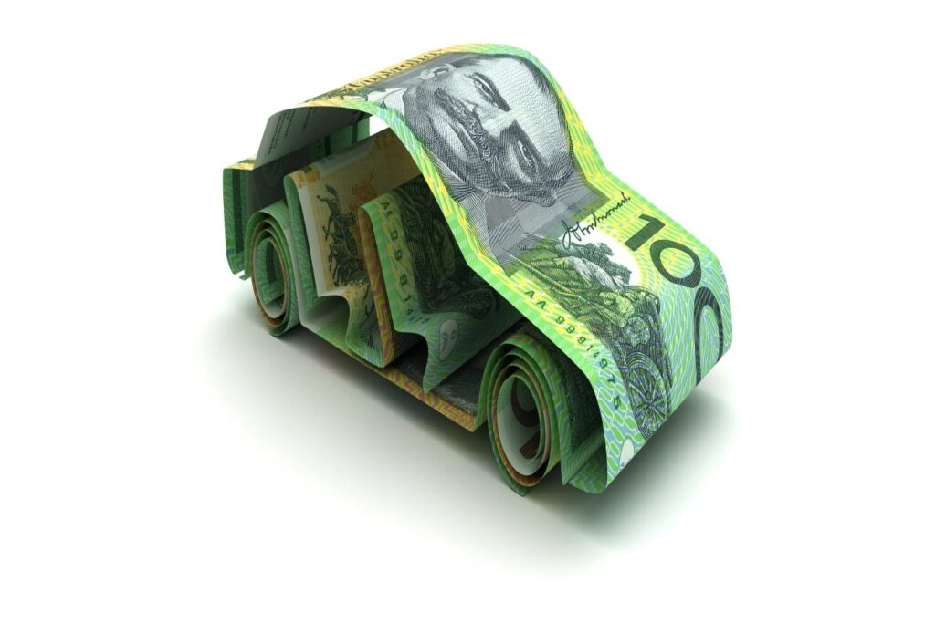 An image of paper money creatively folded into the shape of a car, symbolizing car finance. The design conveys the concept of using money wisely with pre-approved finance during the End of Financial Year (EOFY) period. The background is clean and minimal, keeping focus on the money car as a visual metaphor for smart financial planning.